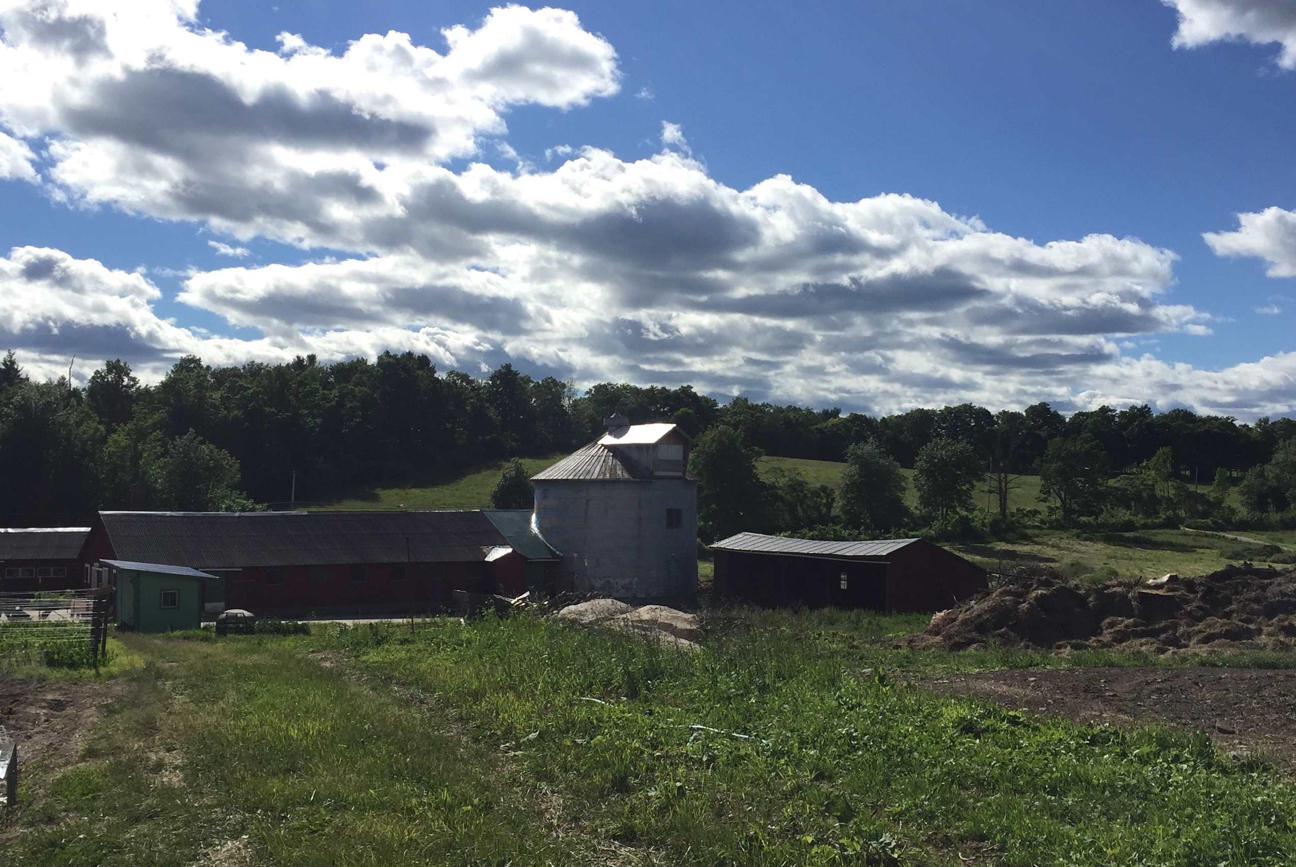 Temple-Wilton Community Farm buildings, fields, and surrounding hills
